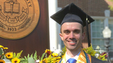 Michael in his graduation gown