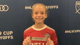 Young girl macrodactyly patient in soccer uniform
