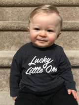 Roman smiling sitting on the stairs