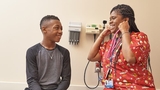 Teen IBD patient undergoing examination