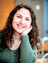 Rianna Sommers sitting down and smiling