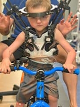 Gavin riding a bike