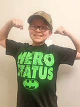 Adam showing his muscles