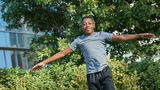 William doing gymnastics outside