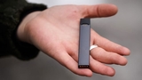 What you need to know about teen vaping hand holding vape