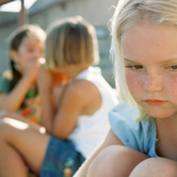 little girl frowning
