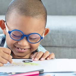 Young boy drawing a picture Young boy drawing a picture