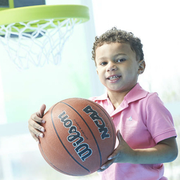 Young boy holding a basketball Young boy holding a basketball