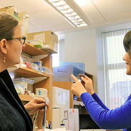 Drs. Eisch and Yun working in the lab Drs. Eisch and Yun working in the lab