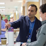 Medical Professionals conferring together