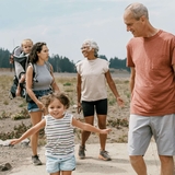Multigenerational family walking