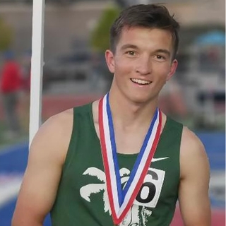 Xavier with track medal
