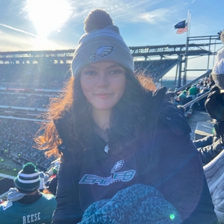 Caitlin is in the stadium.