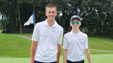 Adam Laird, Golf Professional and Junior Golf Director at the North Shore Country Club, and CHOP patient Skylar Friedman