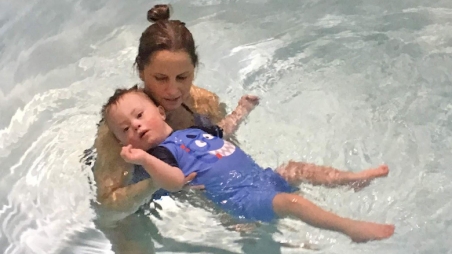Mother and son in pool