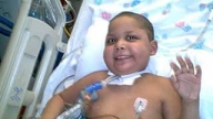 Cellie in his hospital bed