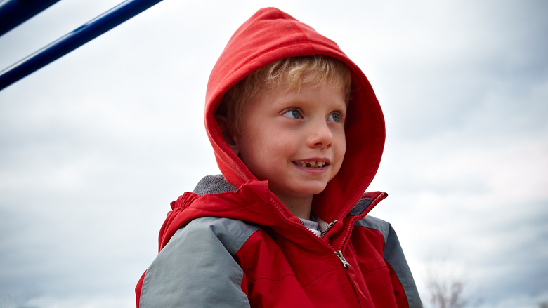 boy wearing jacket with hood