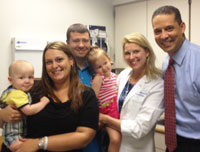 The Woodruff family with Dr. Hedrick and FOX 29 reporter Iain Page.