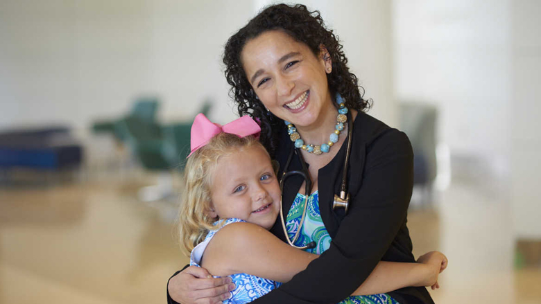 Dr. Yael Mosse with a patient