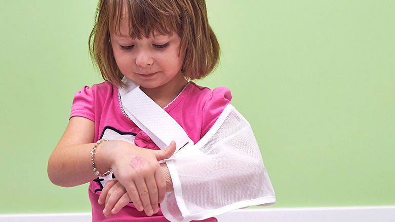 Girl in arm sling